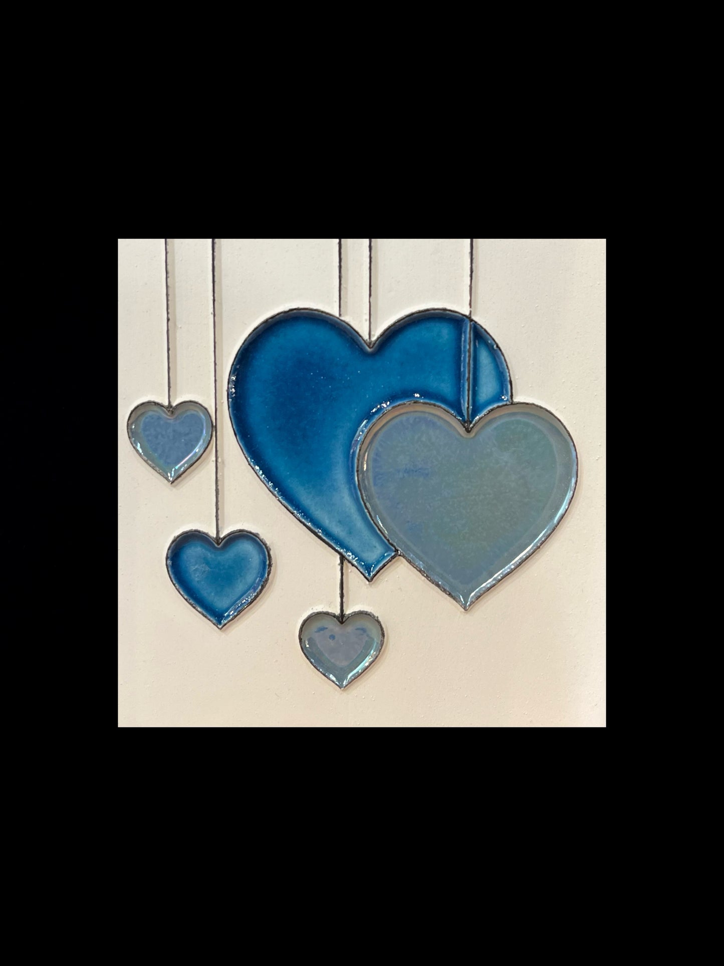 Tableau diffuseur d'huiles essentielles "Coeurs suspendus bleus"